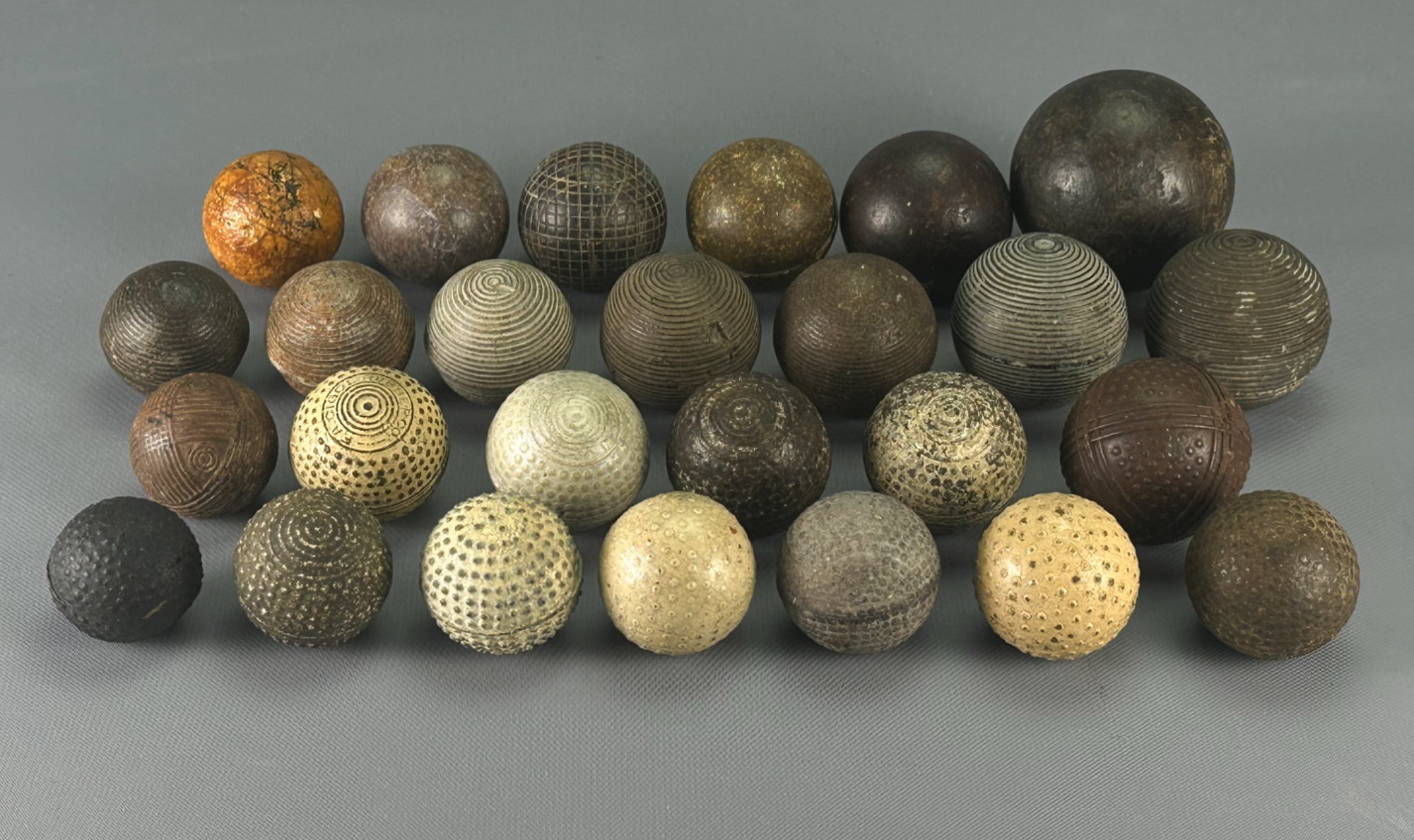 Paramount golf design and various bramble-style hard rubber balls